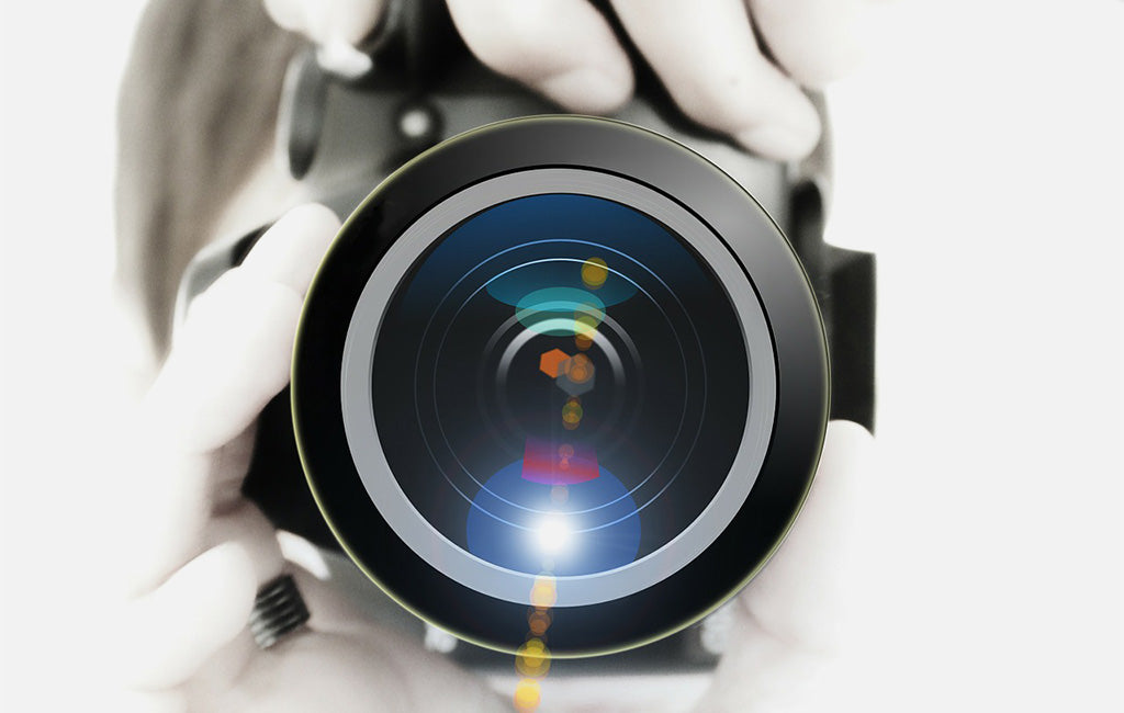 Frau mit Kamera als Motiv für personalisiertes LED Bild